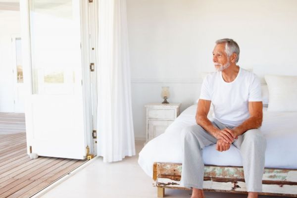 Adult on bed Adult male on bed