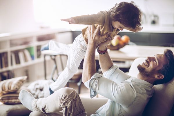 father and son playing