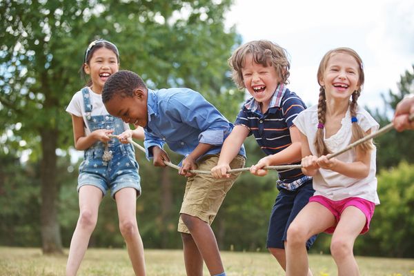 A group of children playing in a park