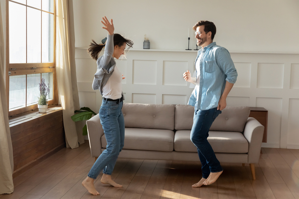 A couple dancing indoors