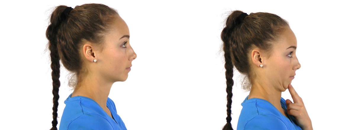 A woman doing a neck retraction exercise