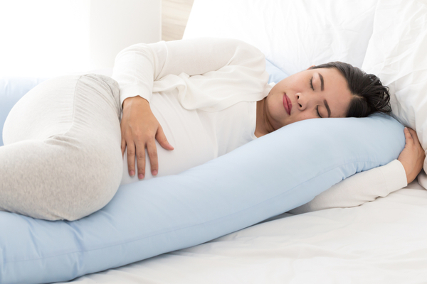 image of a pregnant woman sleeping