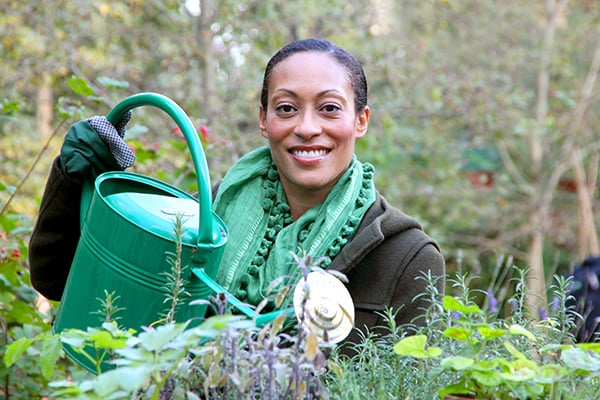 woman using watering can