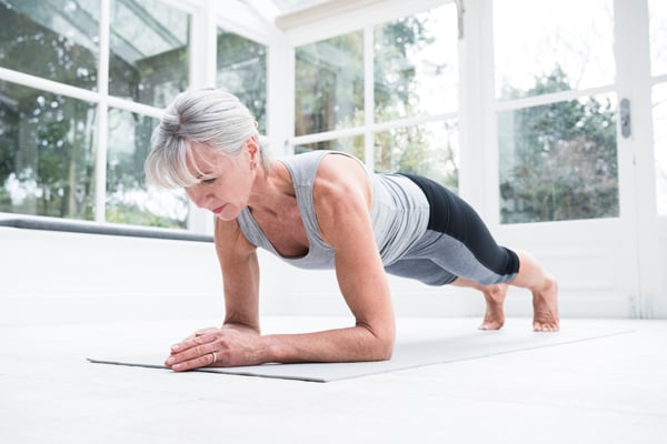 older woman planking