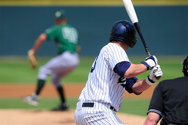 man playing baseball