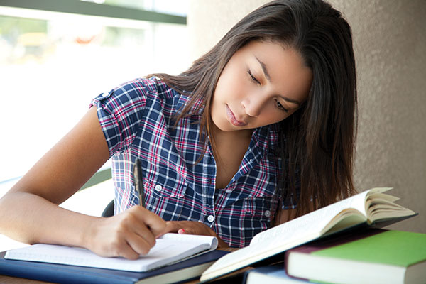 teenage girl studying