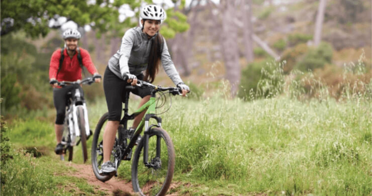 Woman and man cycling