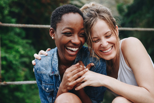 an image of two young women laughing