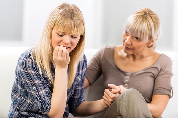 Mom talks to teenage daughter Mom talks to teenage daughter
