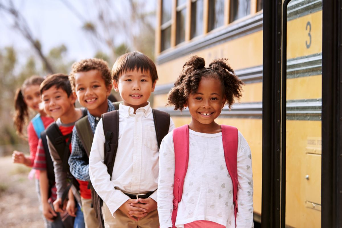 Children waiting at bus