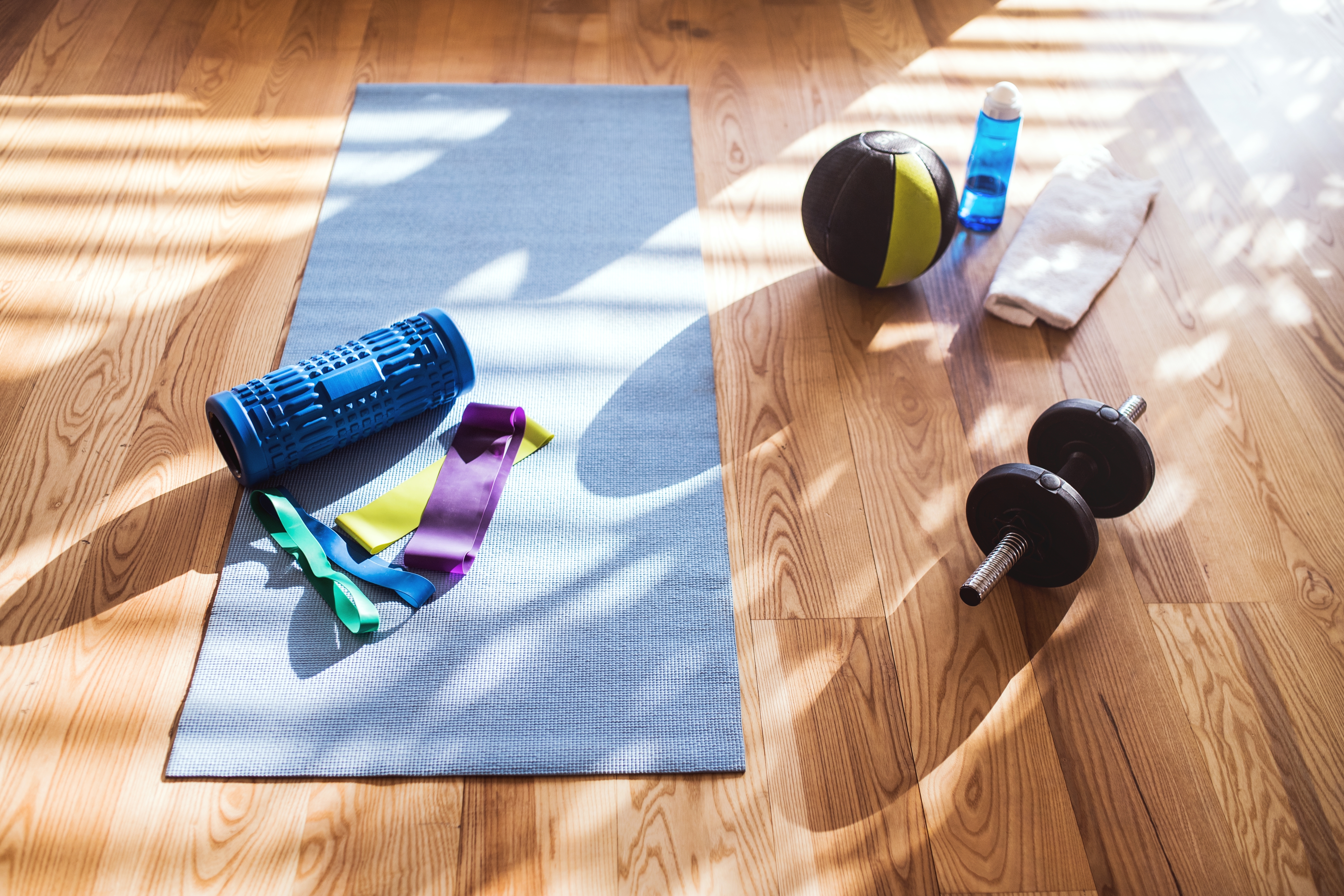 Fitness goals_at home gym equipment, foam roller, bands, weights