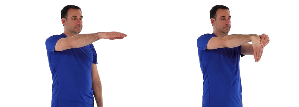 Man performing wrist extension stretch for carpal tunnel syndrome relief