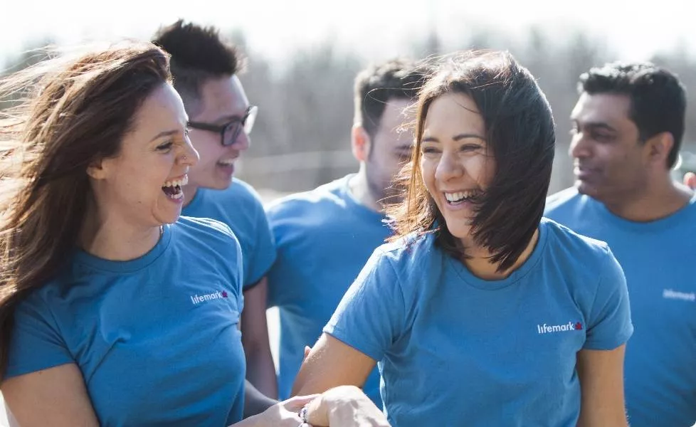 Lifemark team laughing outside