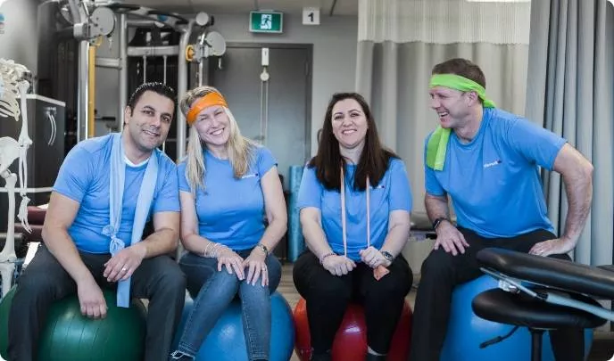 Most admired canada graduates sitting on workout balls