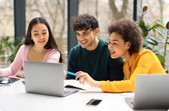 A diverse group of students working on computers