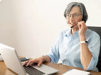 A woman using a headset to speak on a web call